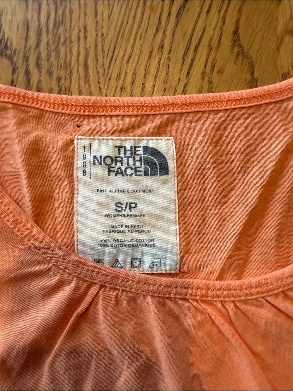 Soft orange/peachand white vintage bird print t-shirt by The North Face - Picture 2 of 7